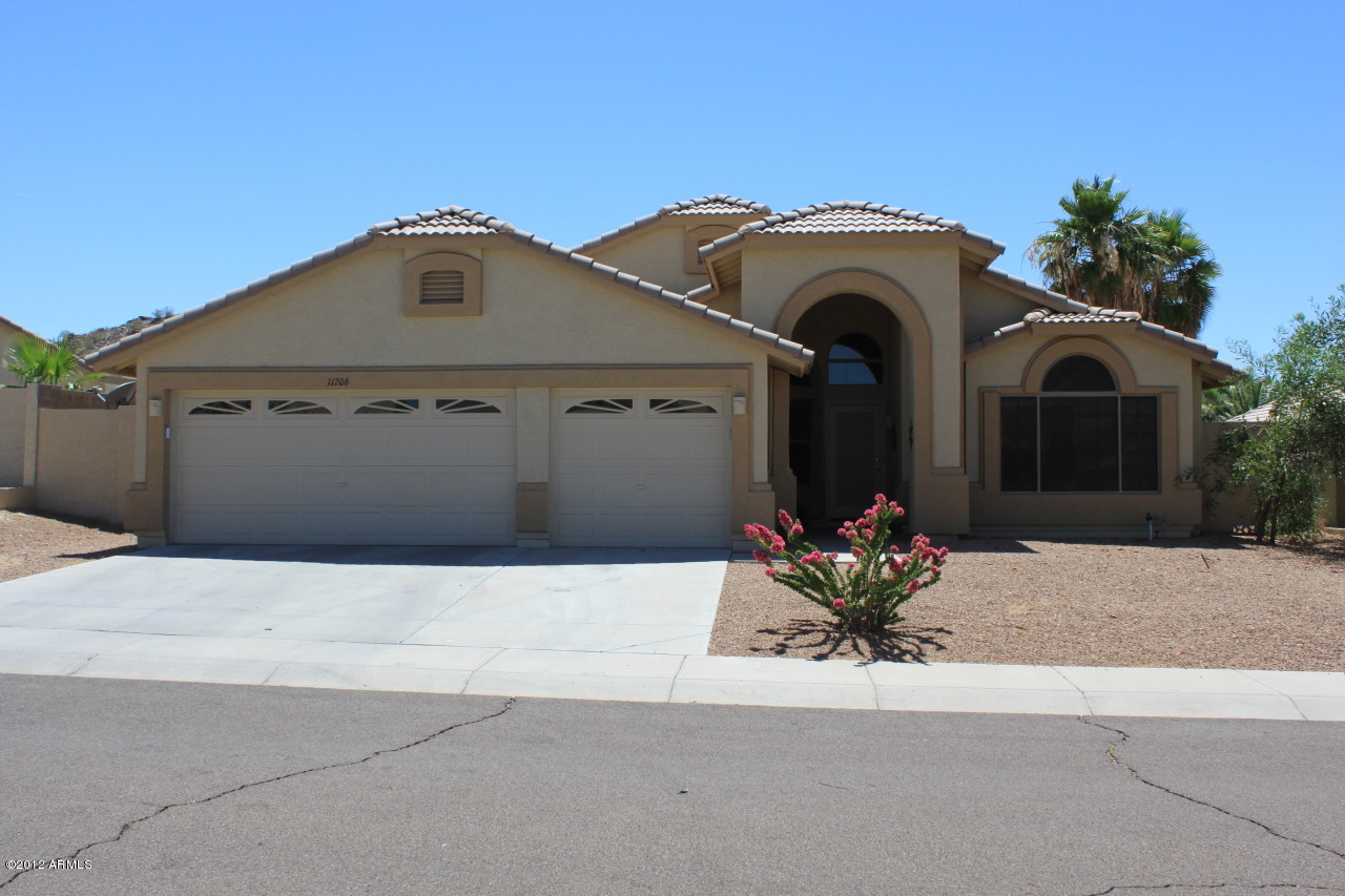 Property Photo:  11206 S Hopi Street  AZ 85338 