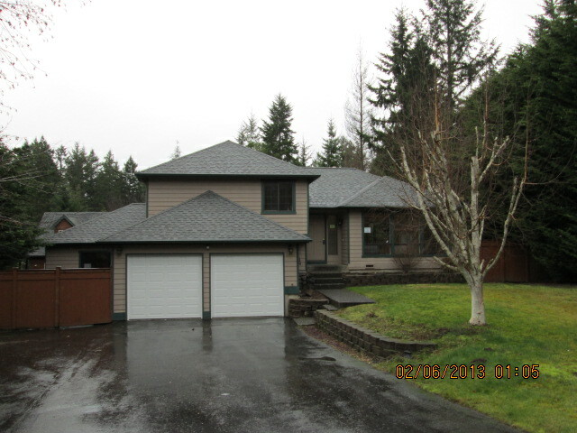 Property Photo:  6446 NW Goldfern Ct  WA 98383 