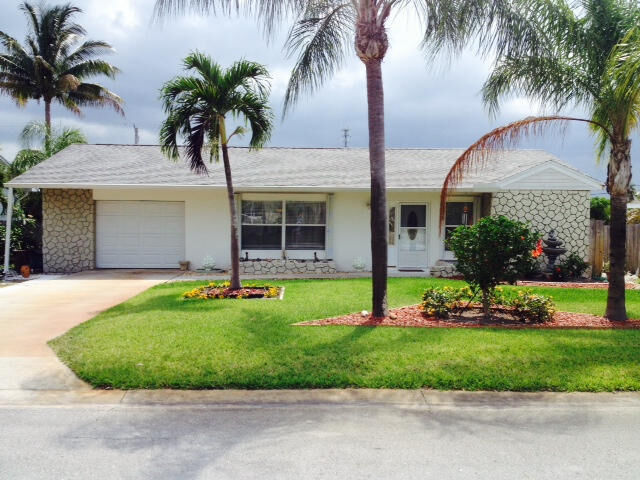 Property Photo:  8714 SE Janice Drive  FL 33455 