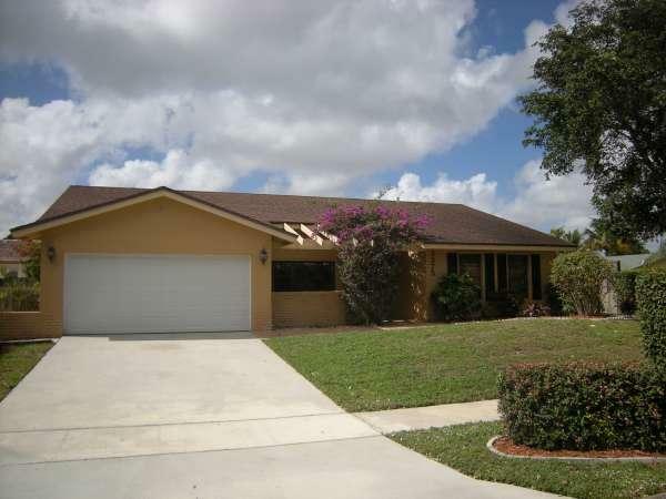 Property Photo:  3375 NW 27th Avenue  FL 33434 