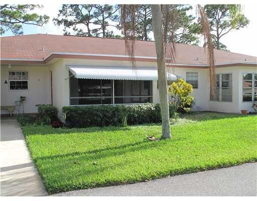 Property Photo:  315 NW 50th Avenue B  FL 33445 