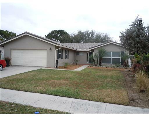 Property Photo:  6414 Woodbury Road  FL 33433 