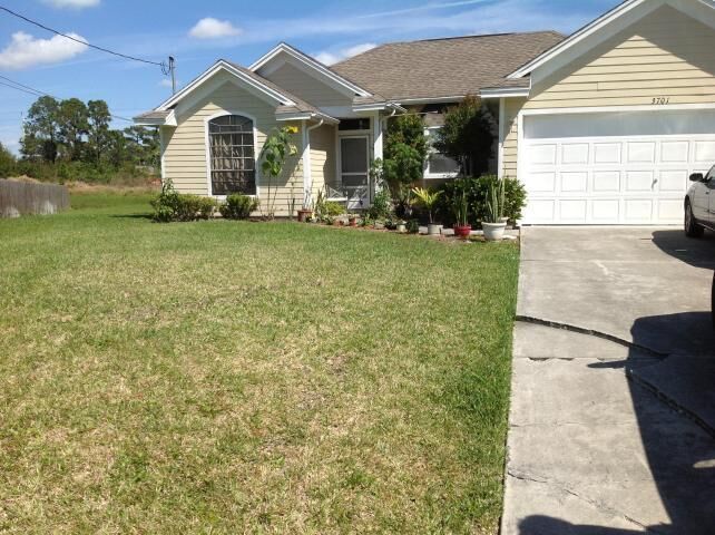 Property Photo:  3701 SW Hulska Street  FL 34953 