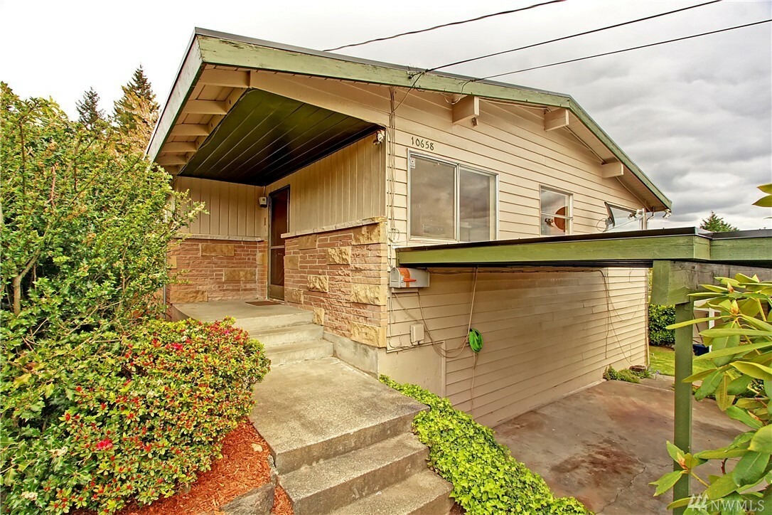 Property Photo:  10658 63rd Ave S  WA 98178 