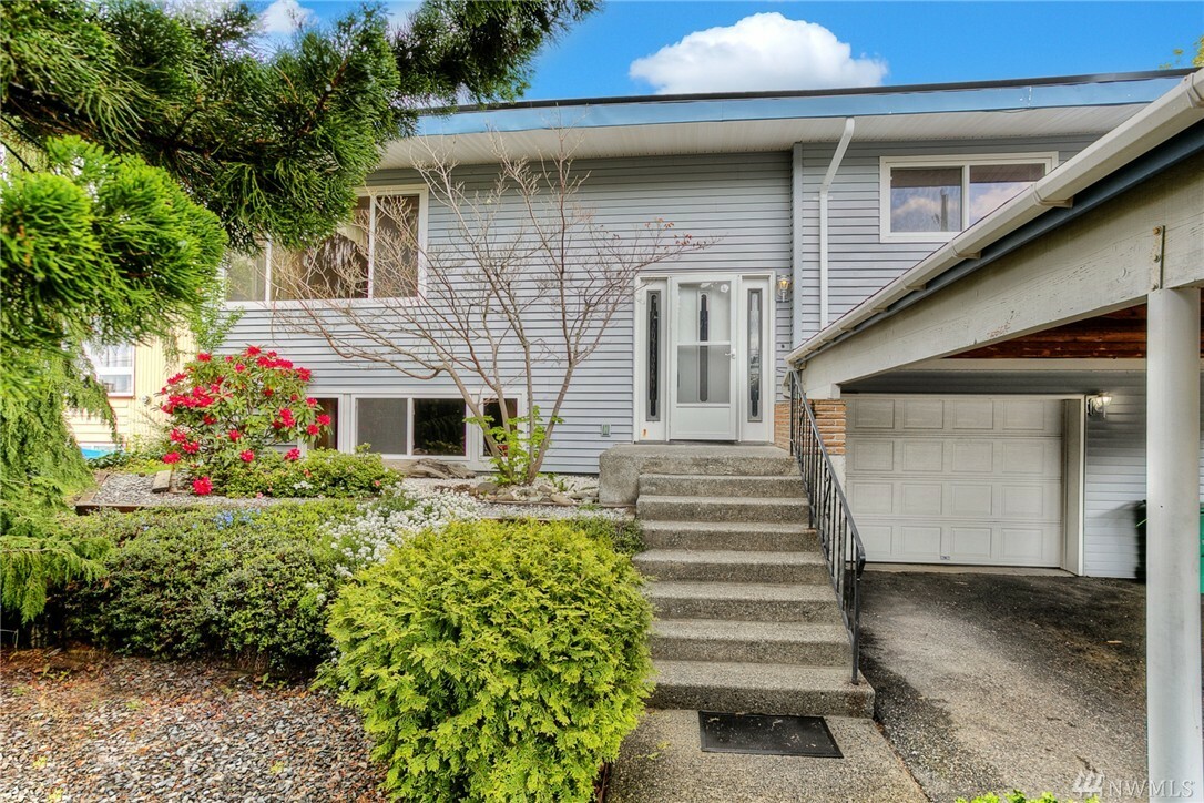 Property Photo:  6434 S 127th Place  WA 98178 