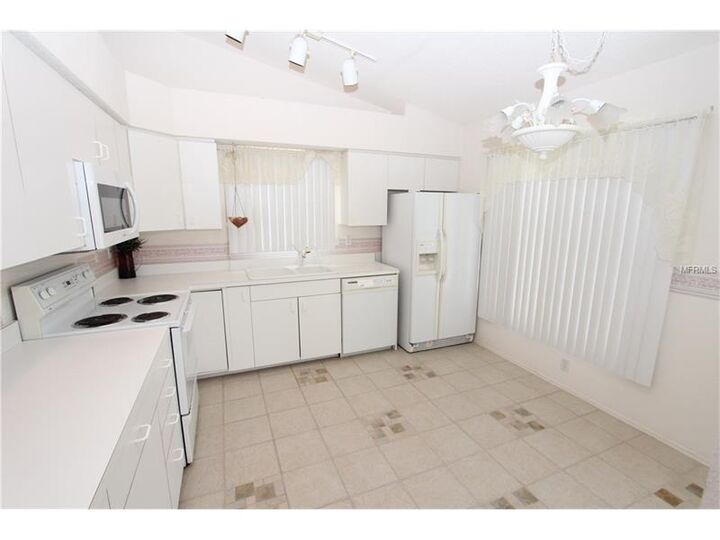 Property Photo:  4839 Raintree Street Circle E  FL 34203 