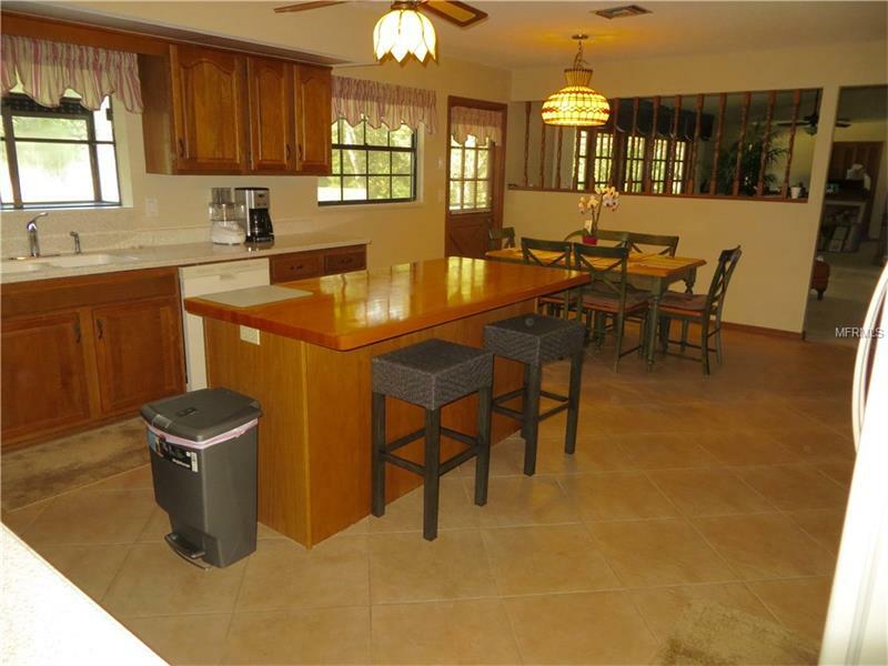 Property Photo: 203 E Greentree Lane FL 32746