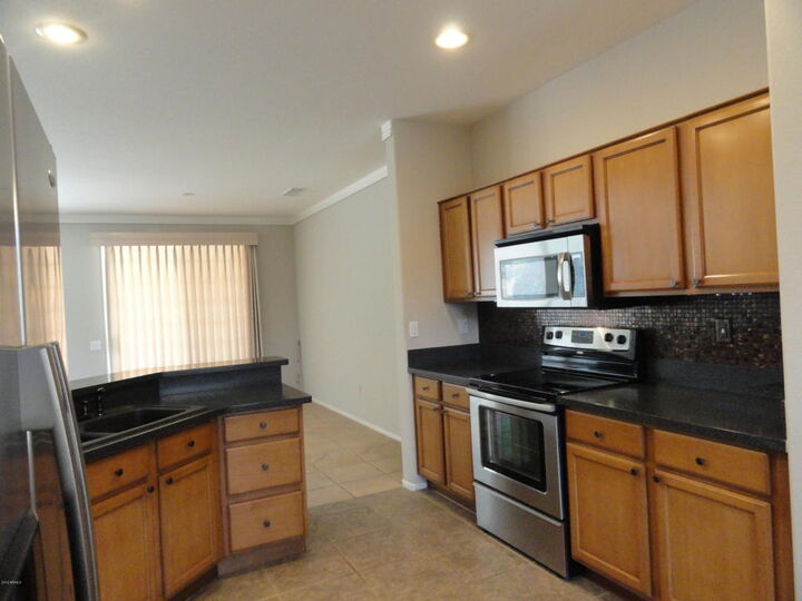 Property Photo: 16506 W Desert Wren Court AZ 85374