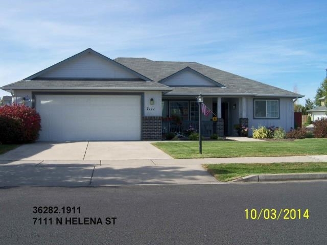 Property Photo:  7111 N Helena  WA 99217 