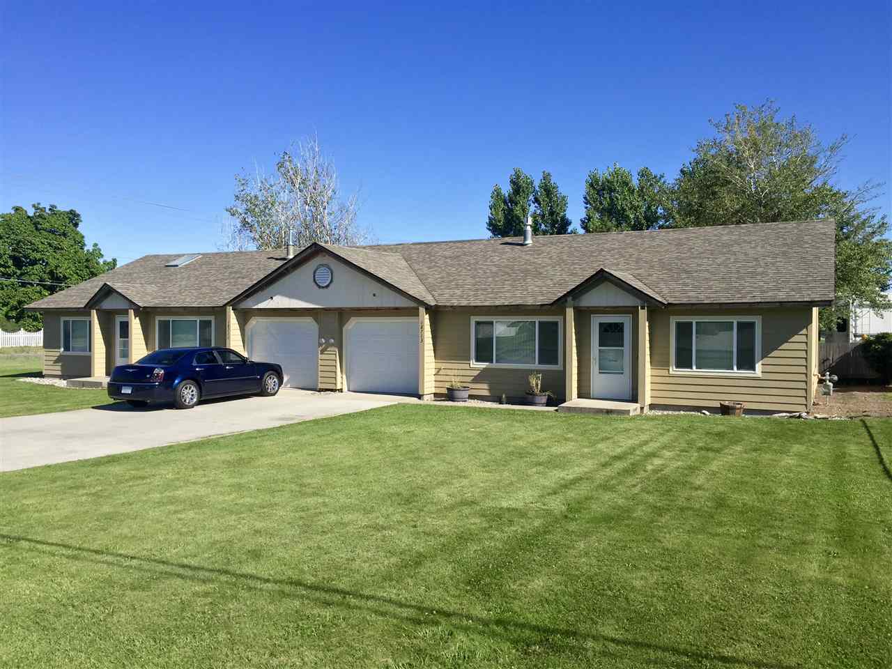 Property Photo: 18711 E 8th Ave 18713 WA 99016-9745