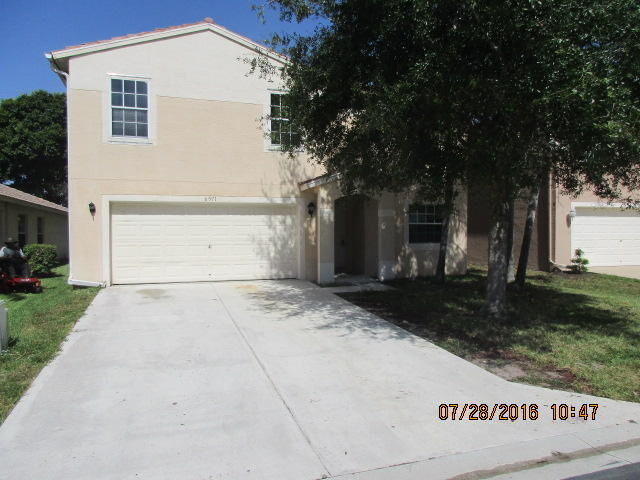Property Photo:  6571 Rainwood Cove Lane  FL 33463 