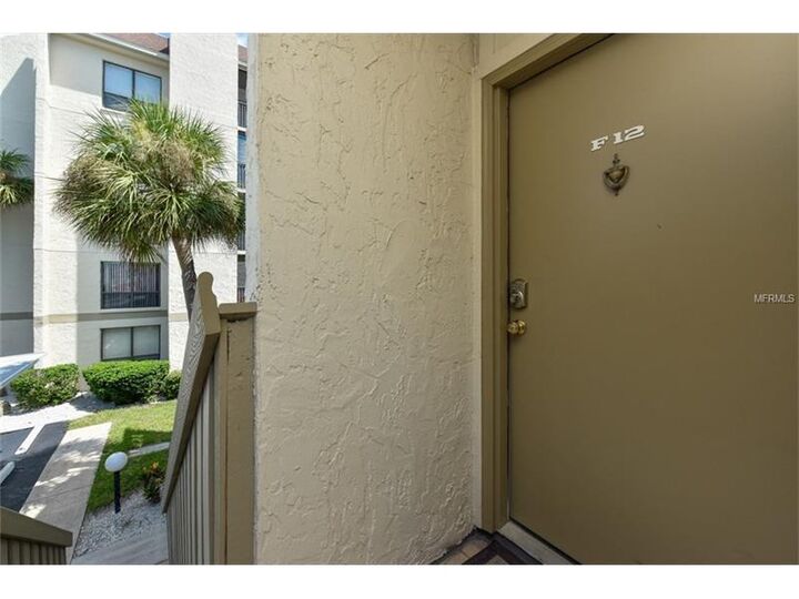 Property Photo:  6157 Midnight Pass Road F12  FL 34242 