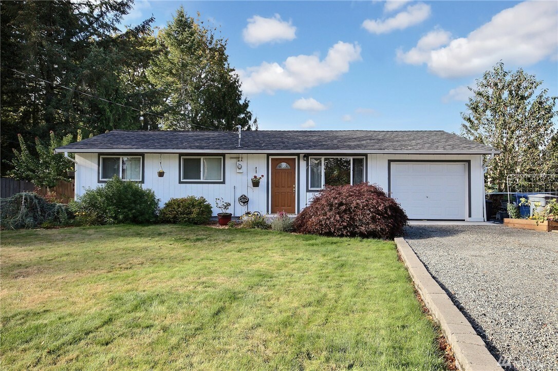 Property Photo:  10607 10th St Ct E  WA 98372 