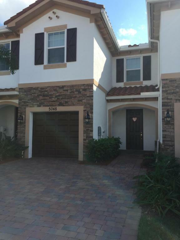 Property Photo:  5048 Ellery Terrace  FL 33417 