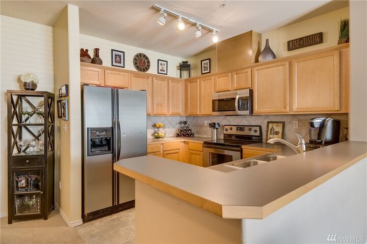 Property Photo:  14915  38th Drive SE E2014  WA 98012 