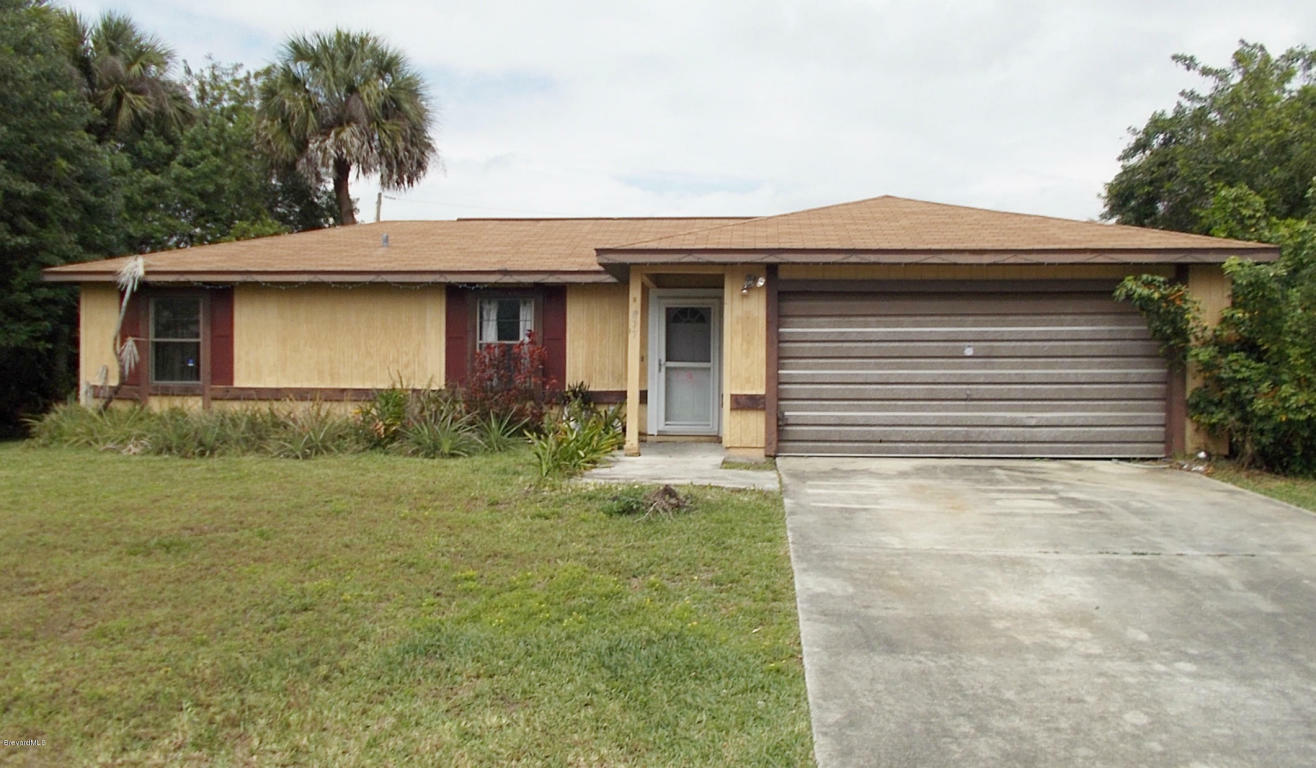 Property Photo:  877 NW Serenade Street  FL 32907 