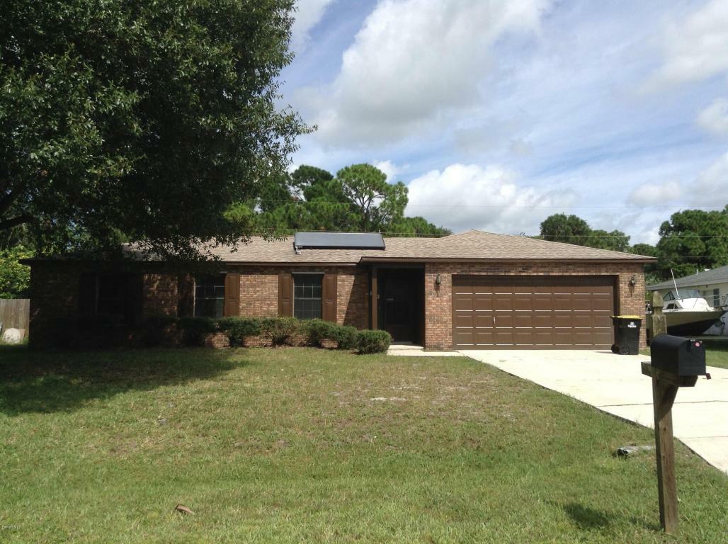 Property Photo:  853 NW Furth Road  FL 32907 