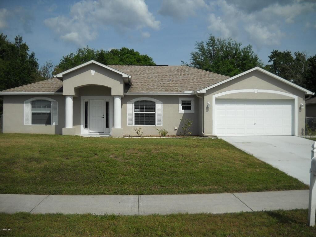 Property Photo:  6585 Addie Avenue  FL 32927 