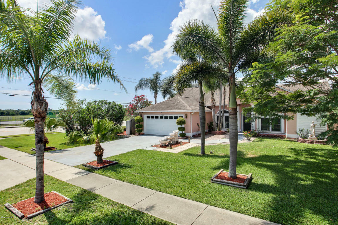 Property Photo:  2123 Royal Poinciana Boulevard  FL 32935 