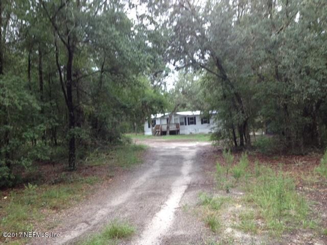 Property Photo: 735 Cr 308B FL 32181