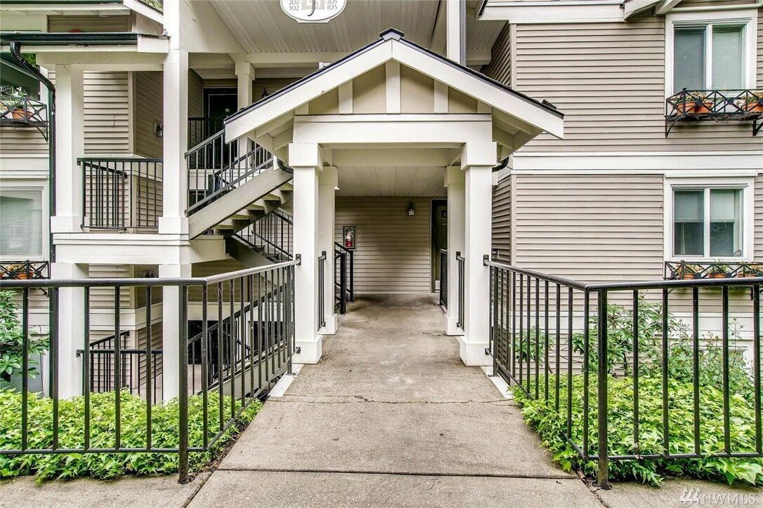 Property Photo:  11223 NE 128th St J302  WA 98034 