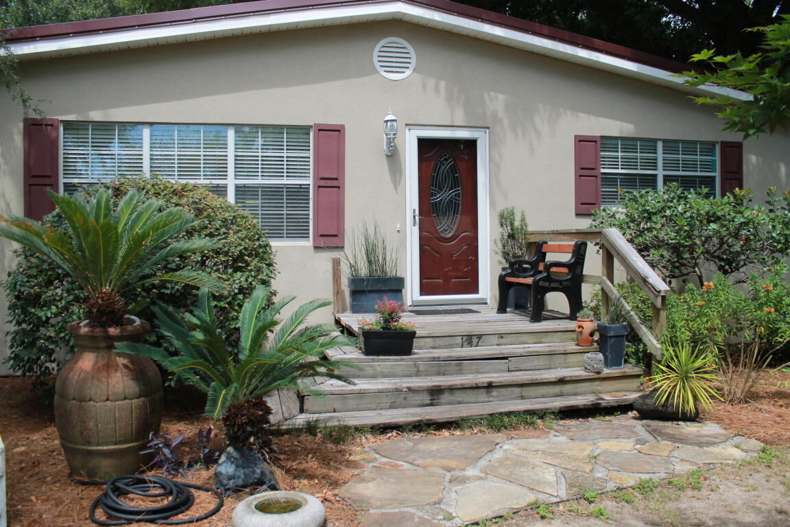 Property Photo:  147 NW Rainbow Drive  FL 32548 