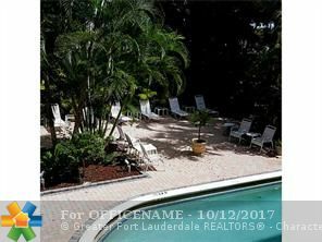 Property Photo:  1407 NE 56th St 201  FL 33334 