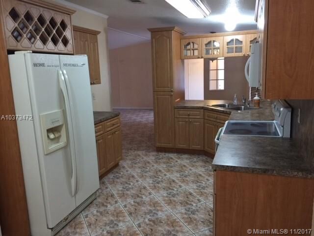 Property Photo:  21800 NW 1st St  FL 33029 