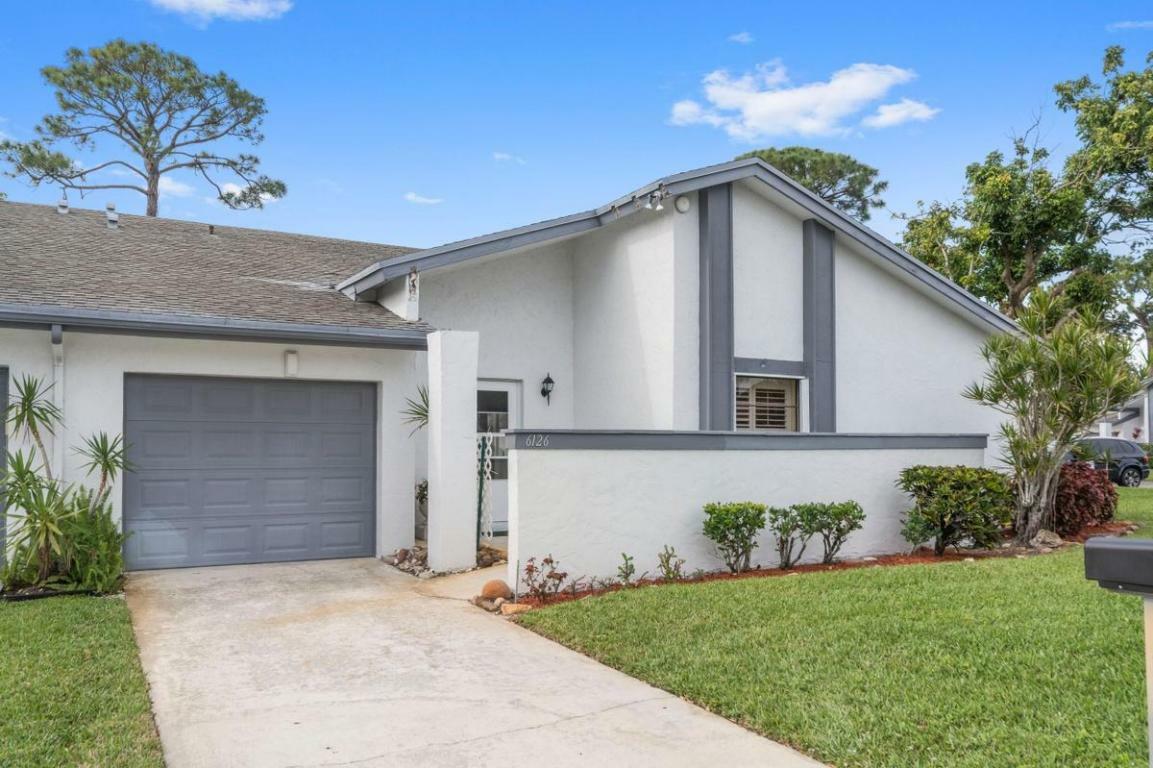 Property Photo:  6126 Elsinore Circle  FL 33463 