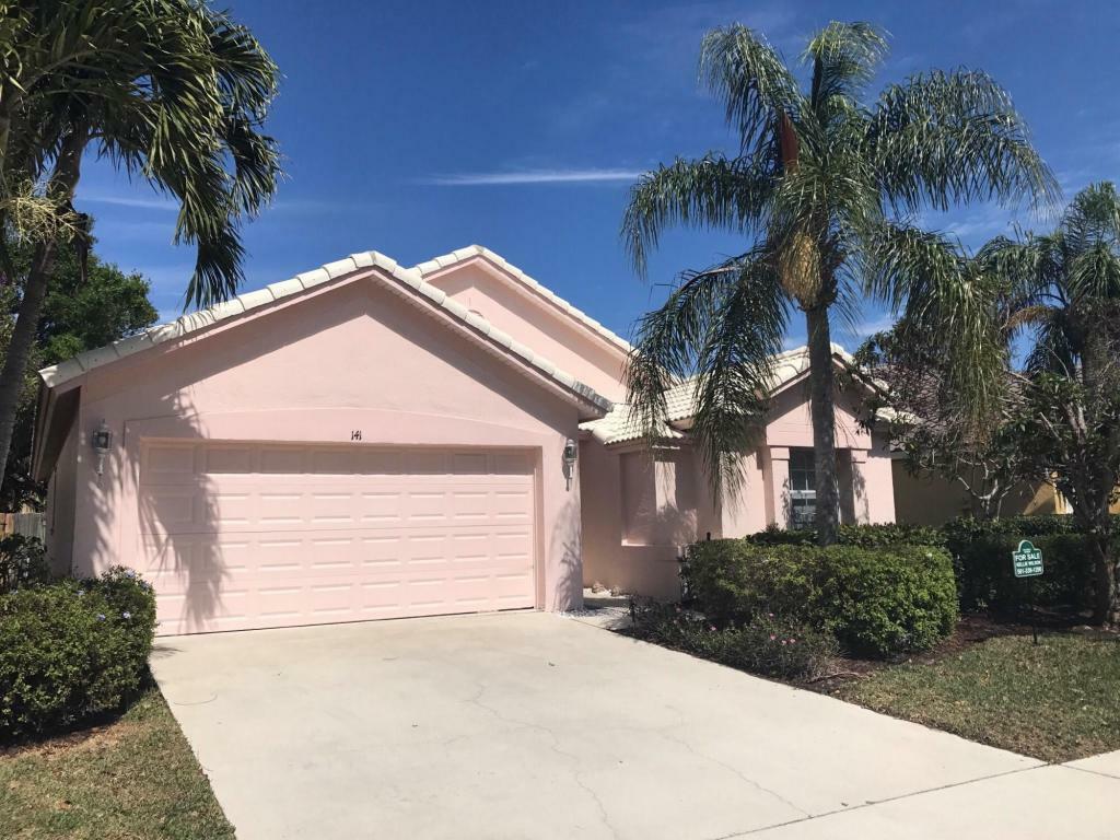 Property Photo: 141 Stonebriar Boulevard FL 33458
