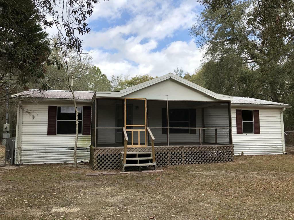 Property Photo:  6390 Bucknell Ave  FL 32656 