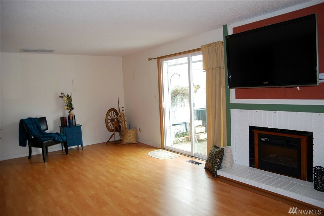 Property Photo: 8648 Onyx Dr SW B WA 98498
