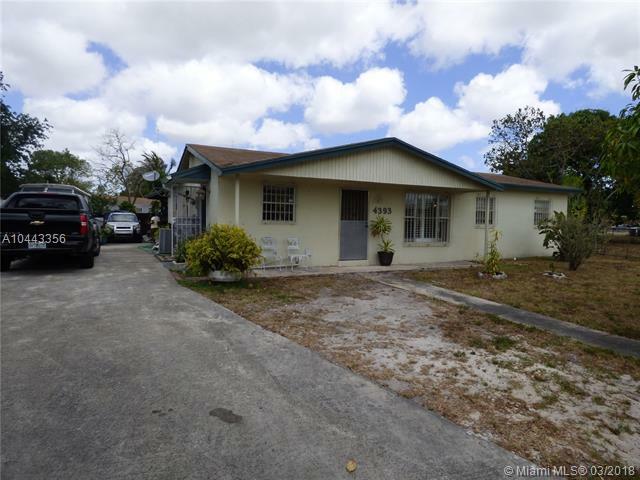 Property Photo: 4393 NW 202nd St FL 33055