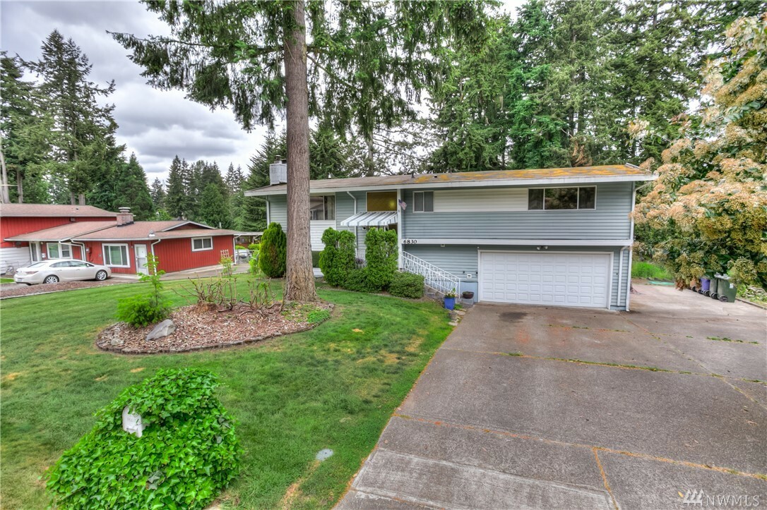 Property Photo:  6830 Roosevelt Ave  WA 98404 