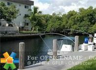 Property Photo:  1400 NE 55th St 204  FL 33334 