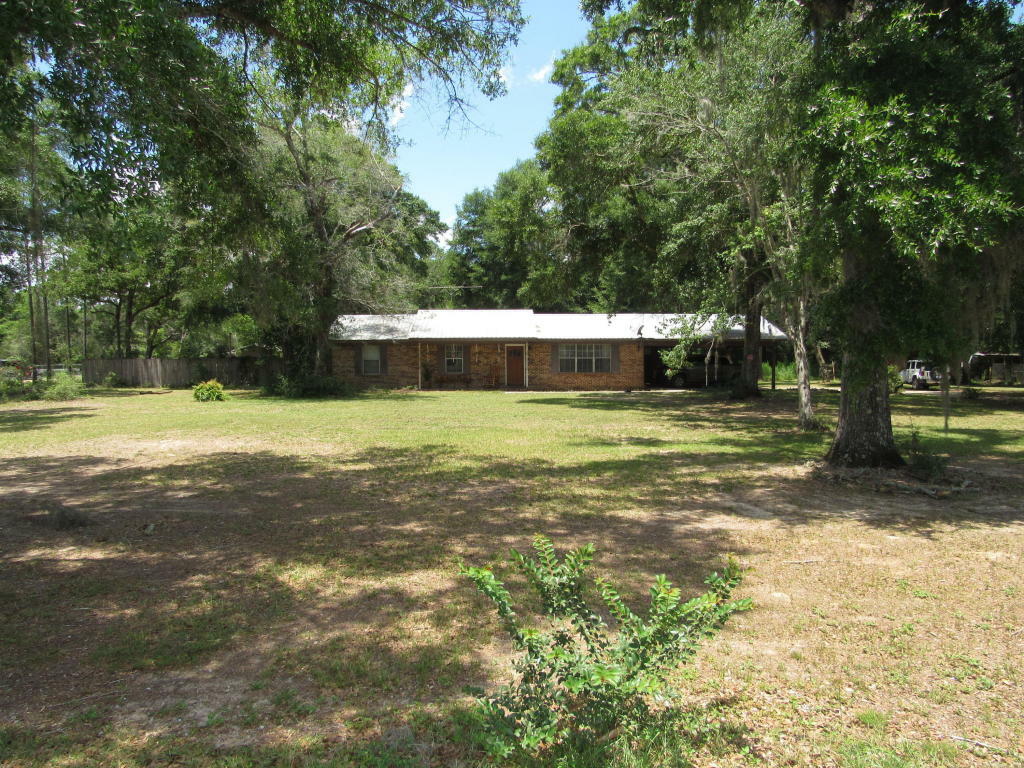 Property Photo:  5700 J V Woolley Road  FL 32539 