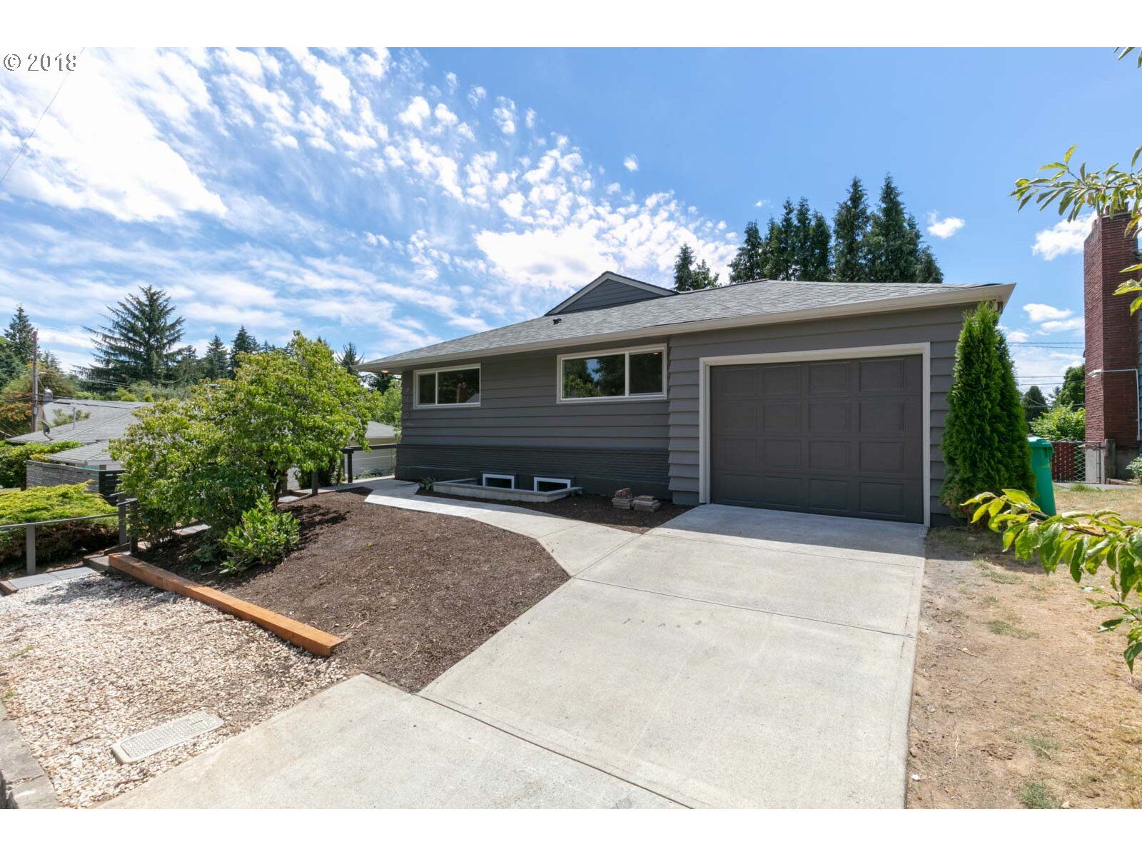 Property Photo:  7120 SE Lincoln St  OR 97215 