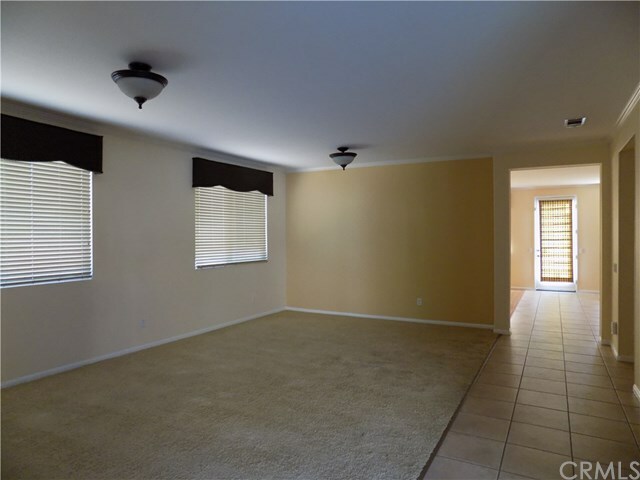 Property Photo:  9893 Paseo Cayuco  CA 92557 