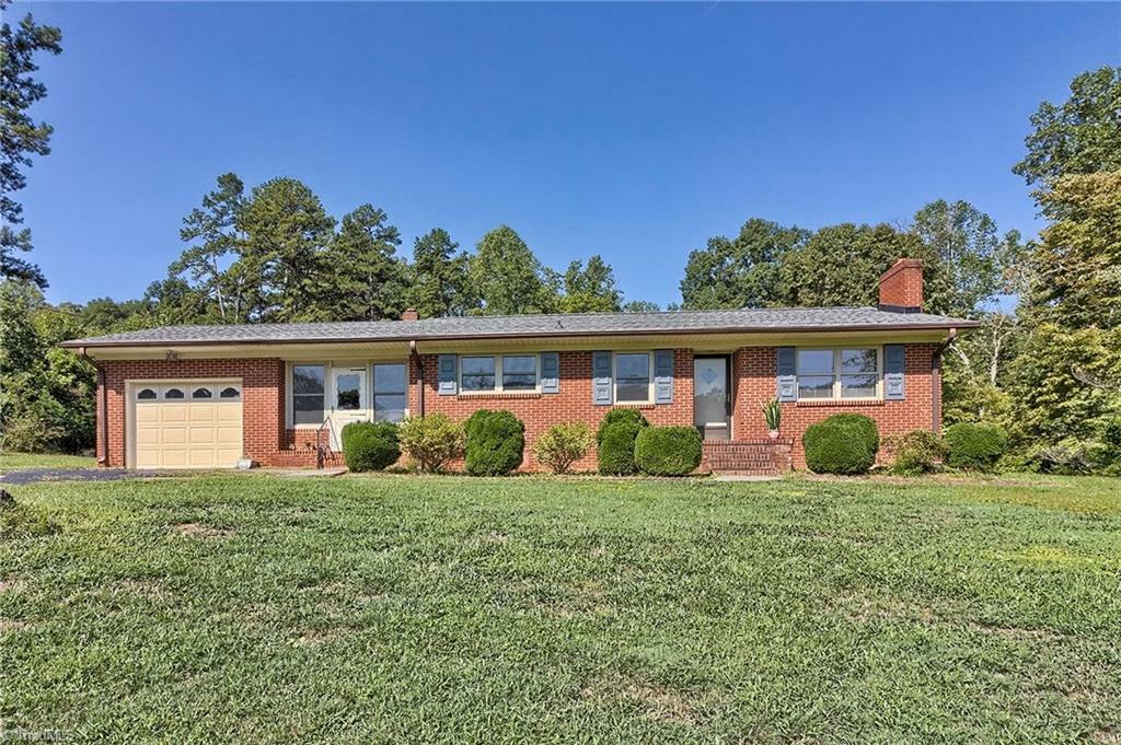 Property Photo:  415 Yadkin College Road  NC 27295 