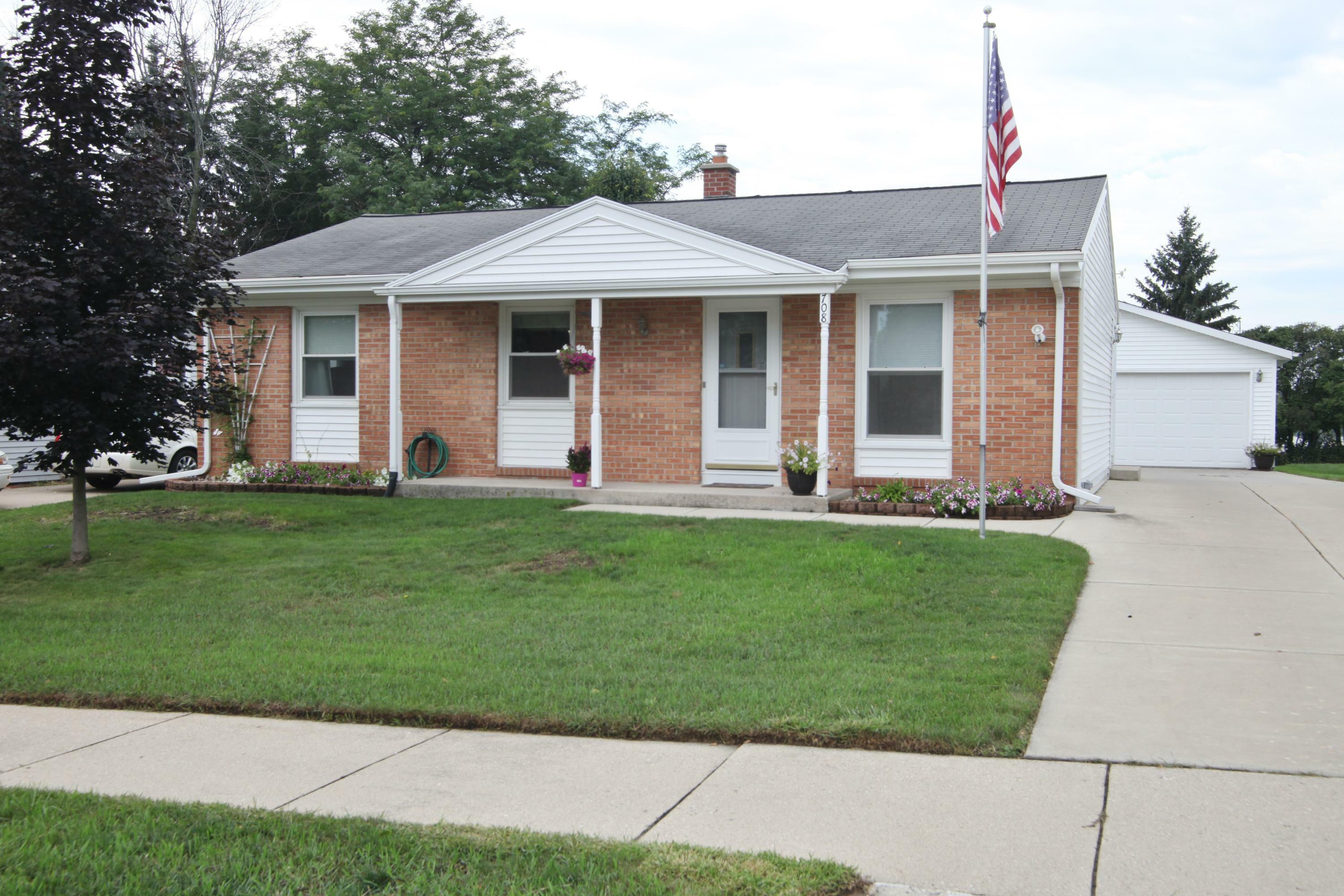 Property Photo: 708 Lenora Dr WI 53090