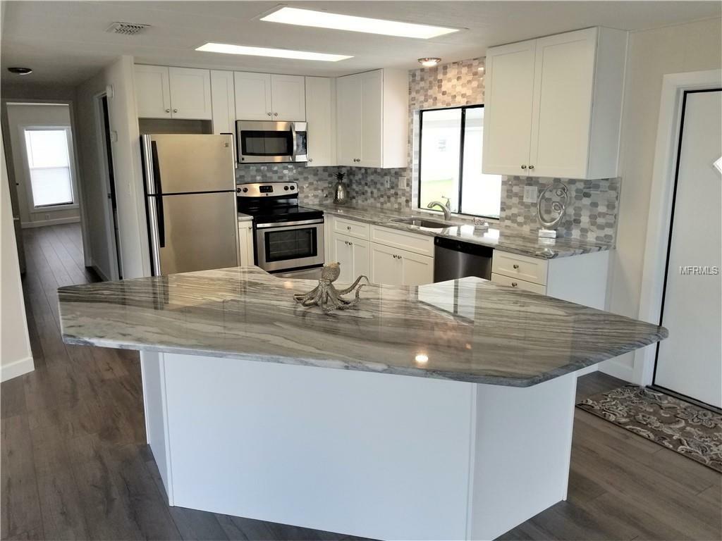 Property Photo: 338 Canal Way FL 34677