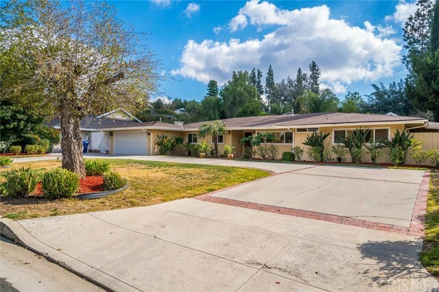 Property Photo:  4540 Del Moreno Drive  CA 91364 