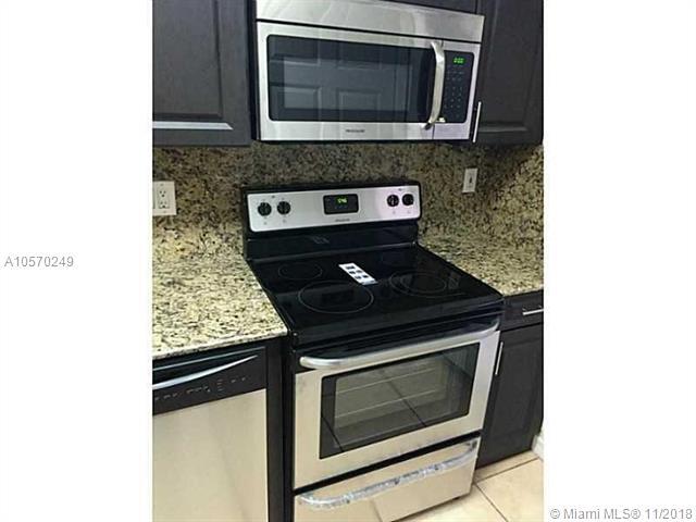 Property Photo: 3360 W 80th St 201 FL 33018
