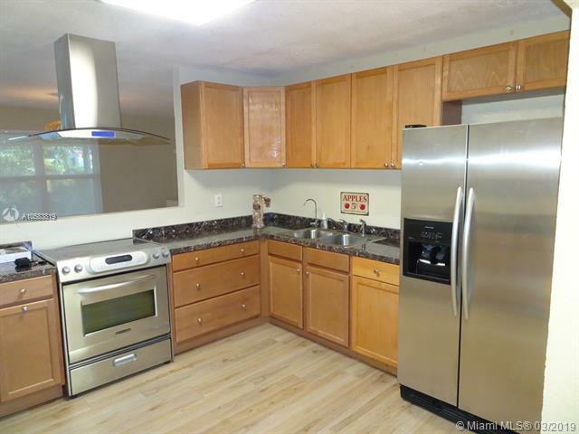 Property Photo:  4711 SW 25th Ave  FL 33312 