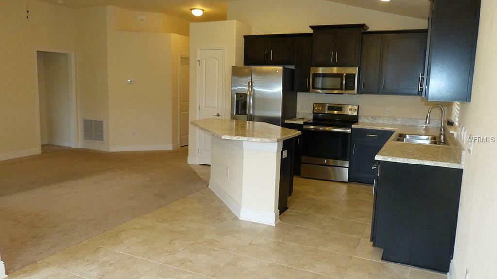 Property Photo: 14434 Scottburgh Glen Drive FL 33598