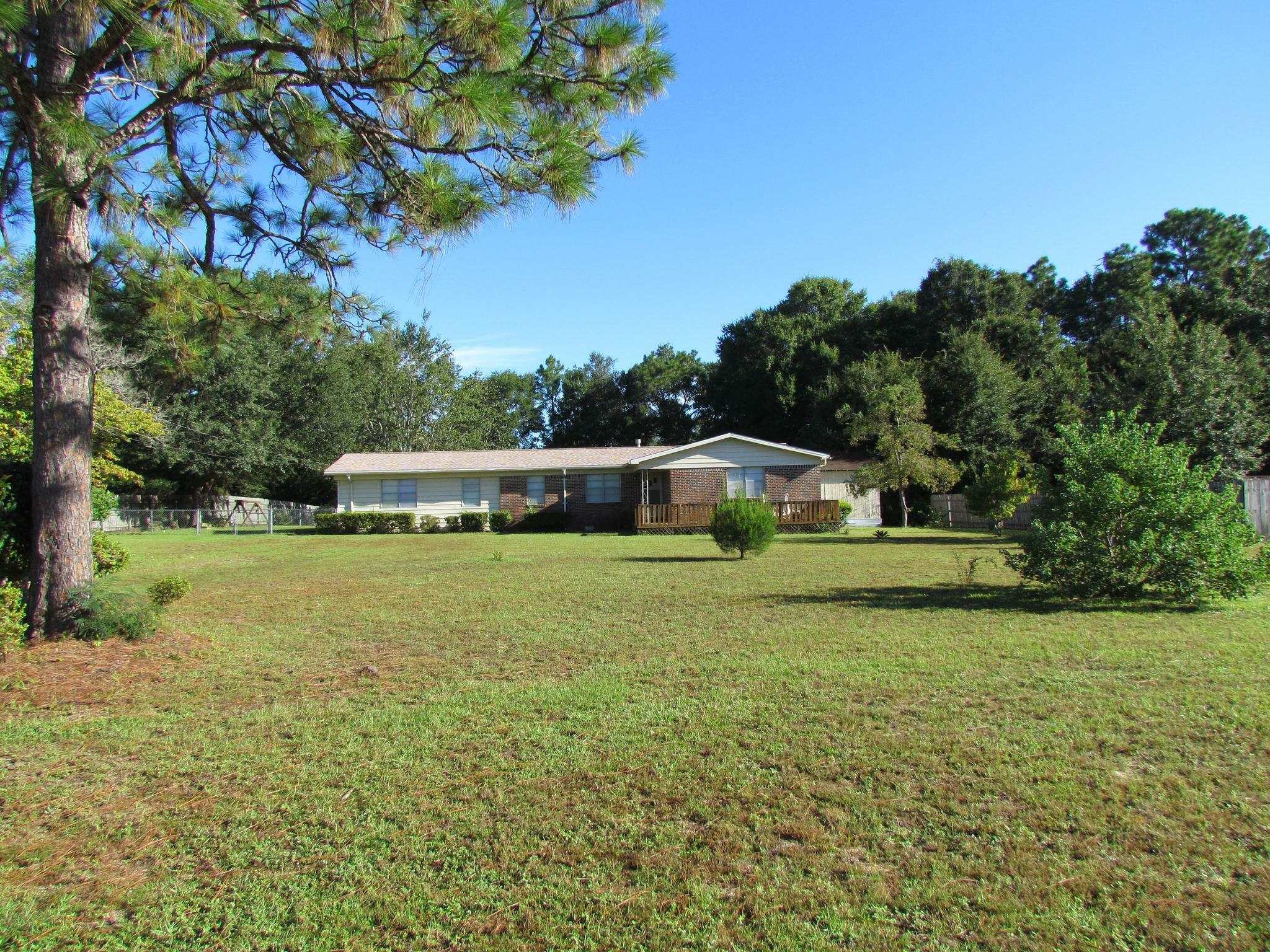 Property Photo:  2957 NE 2nd Avenue  FL 32539 