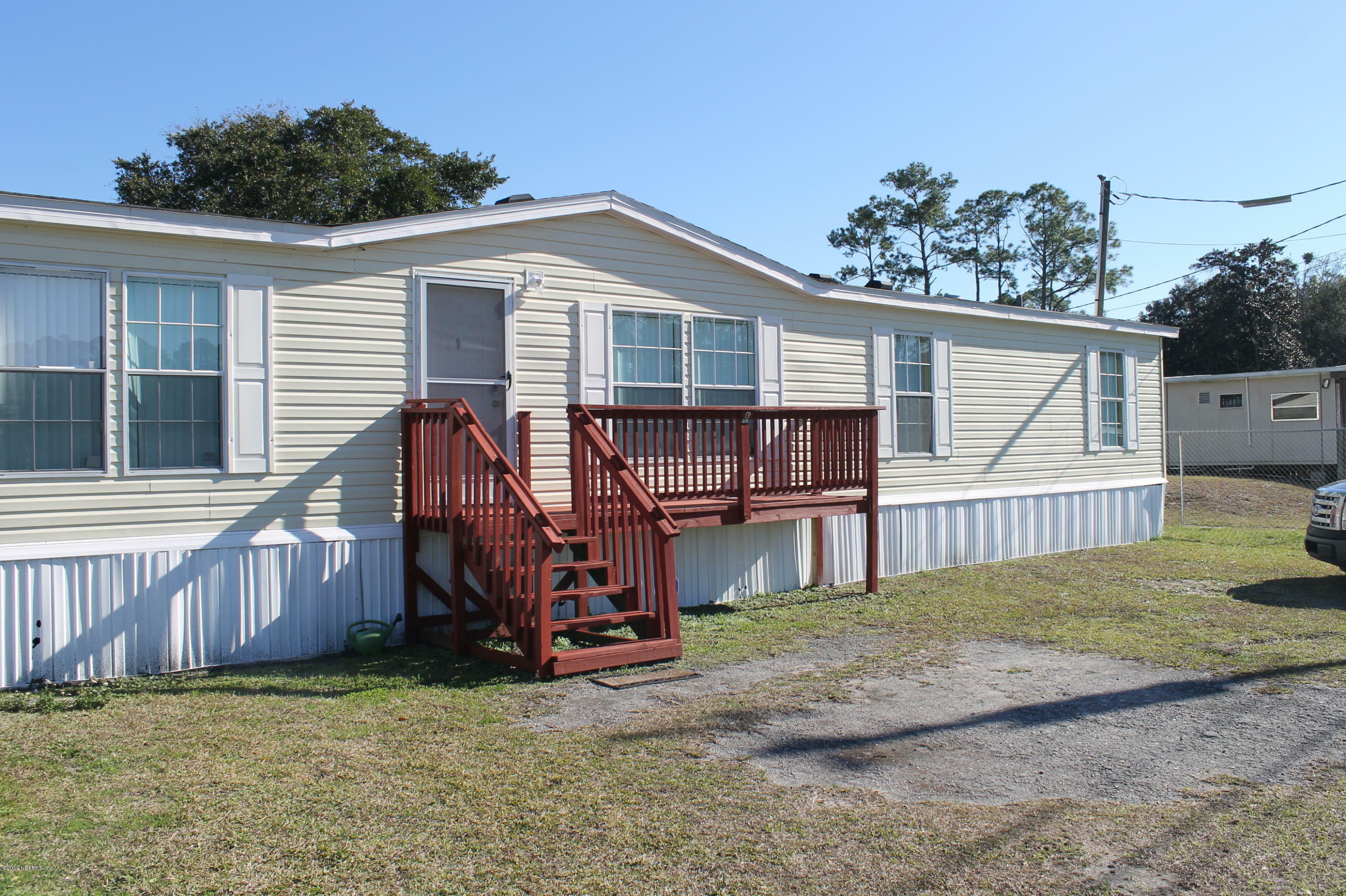 Property Photo:  13927 Benton Street  FL 32218 