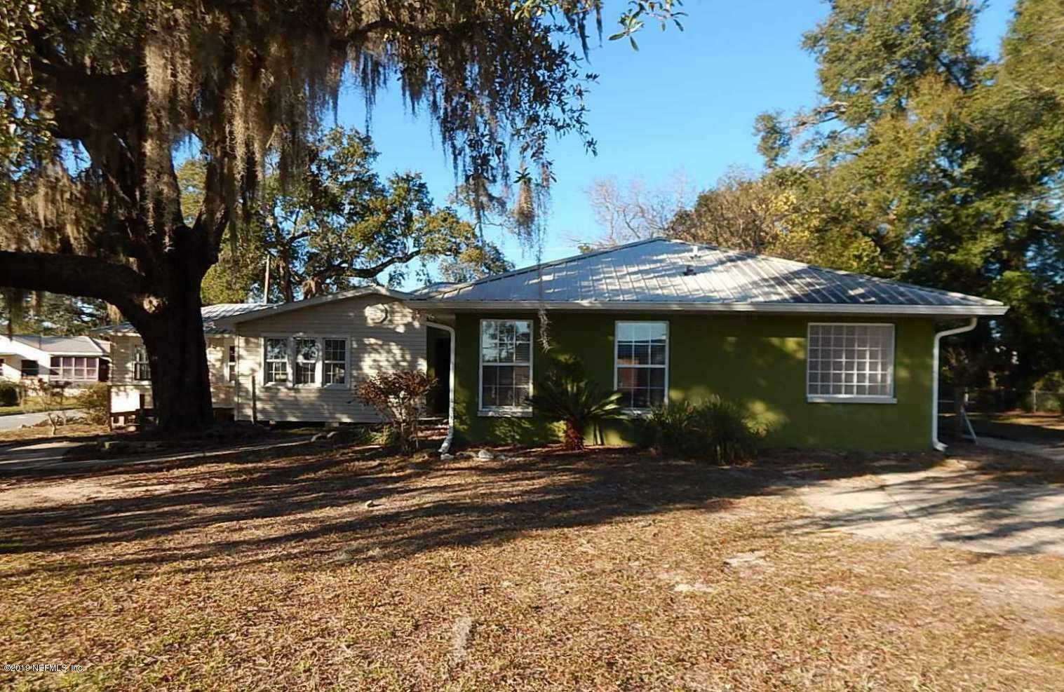 Property Photo:  105 NE Holly Ave  FL 32656 