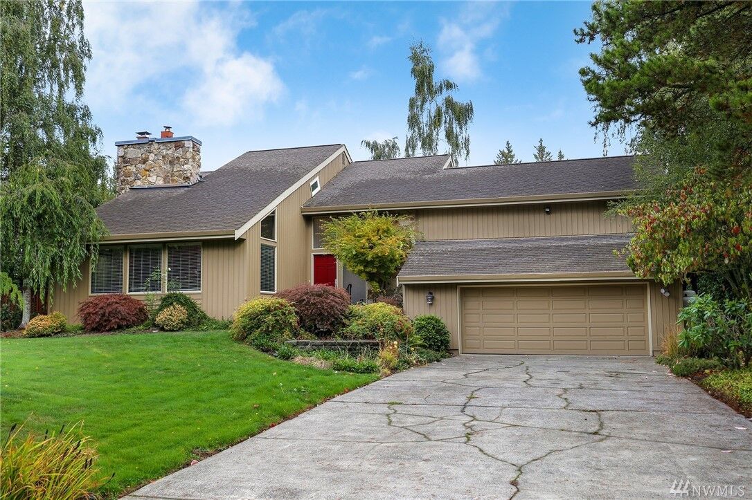 Property Photo:  8490 NE Meadowmeer Dr  WA 98110 