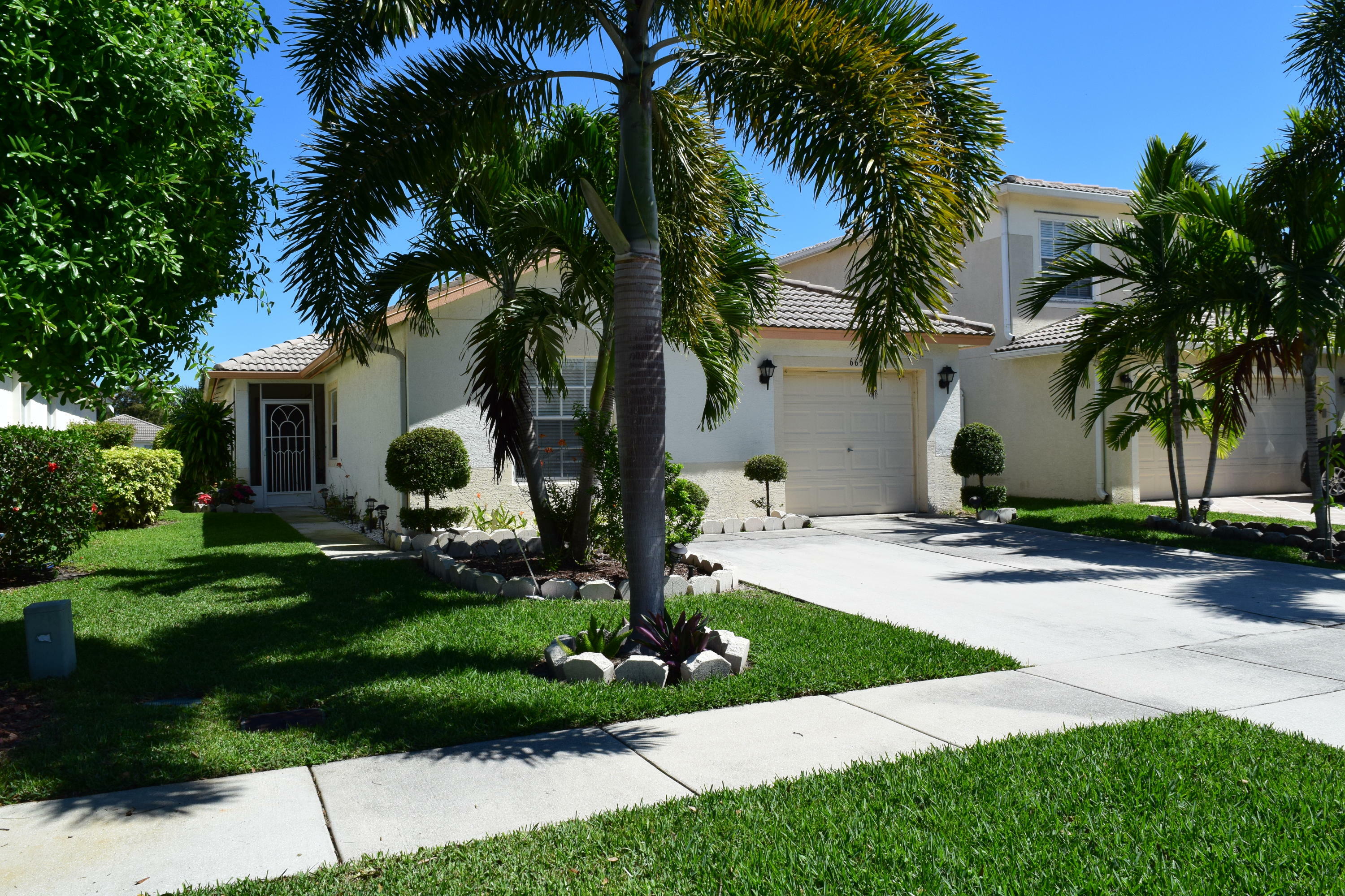 Property Photo:  6630 Spring Garden Run  FL 33463 